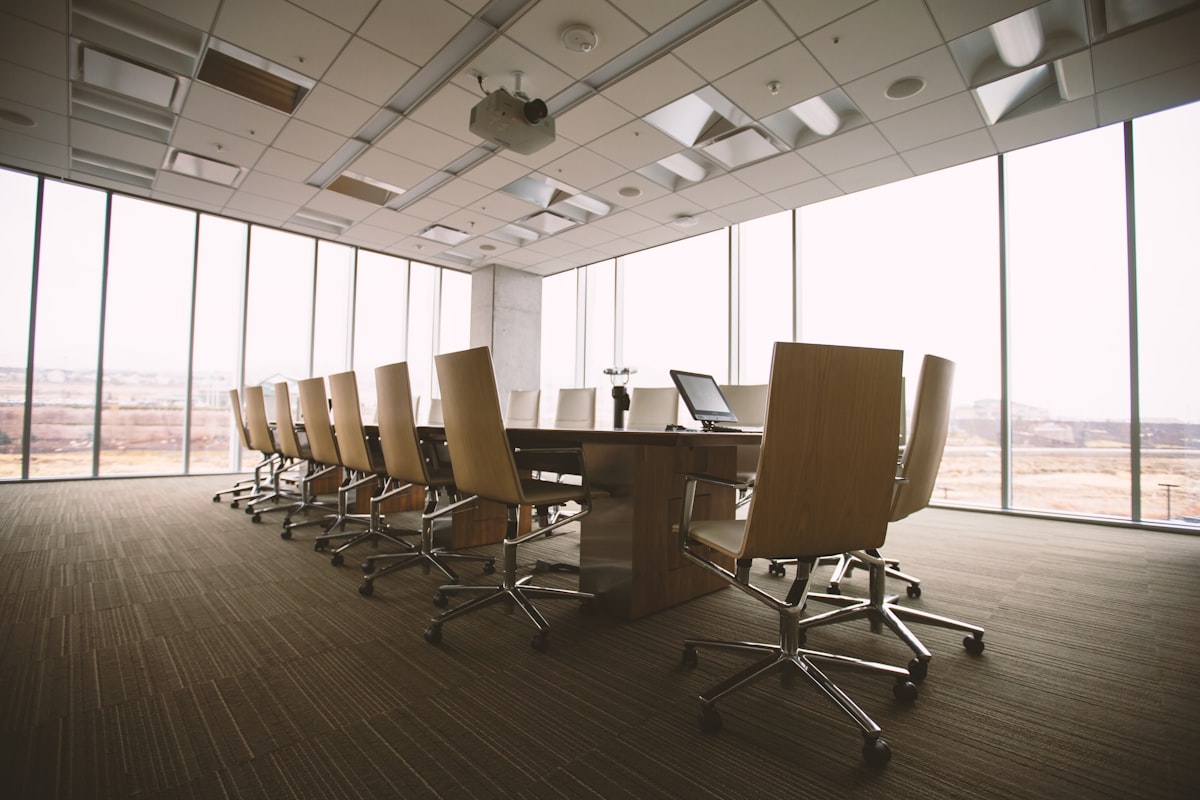 commercial conference room with recessed LED lighting and smart controls