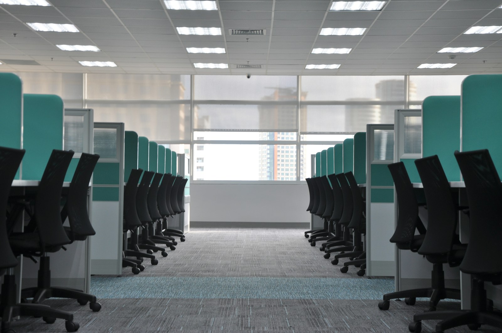 modern commercial office building interior with integrated smart lighting controls and BMS connectivity
