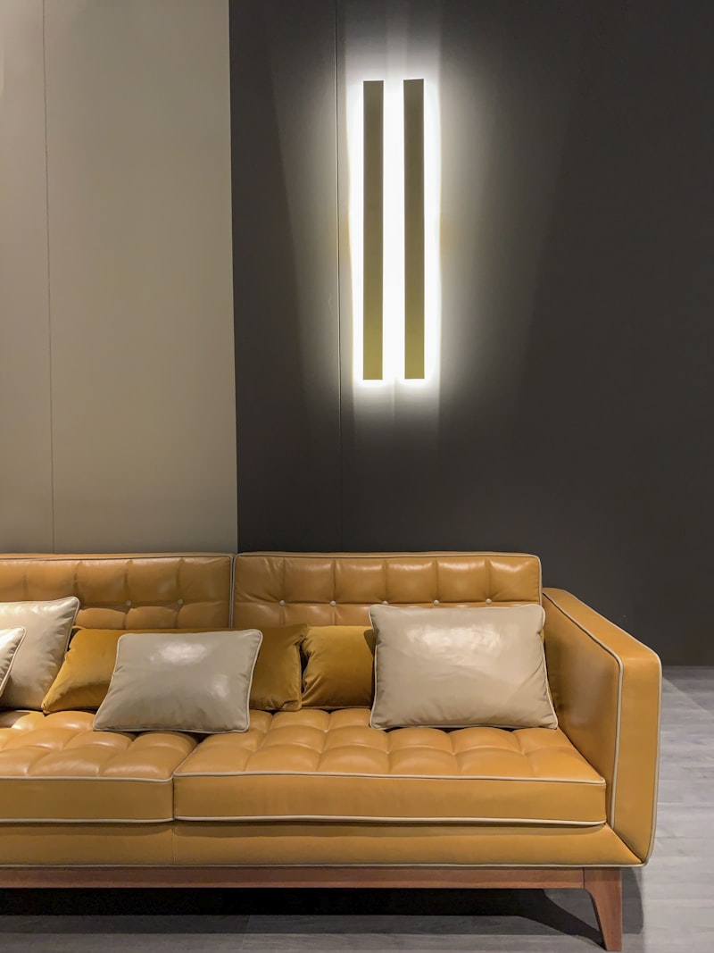 Modern space with dimmable LED wall sconce providing adjustable ambient lighting
