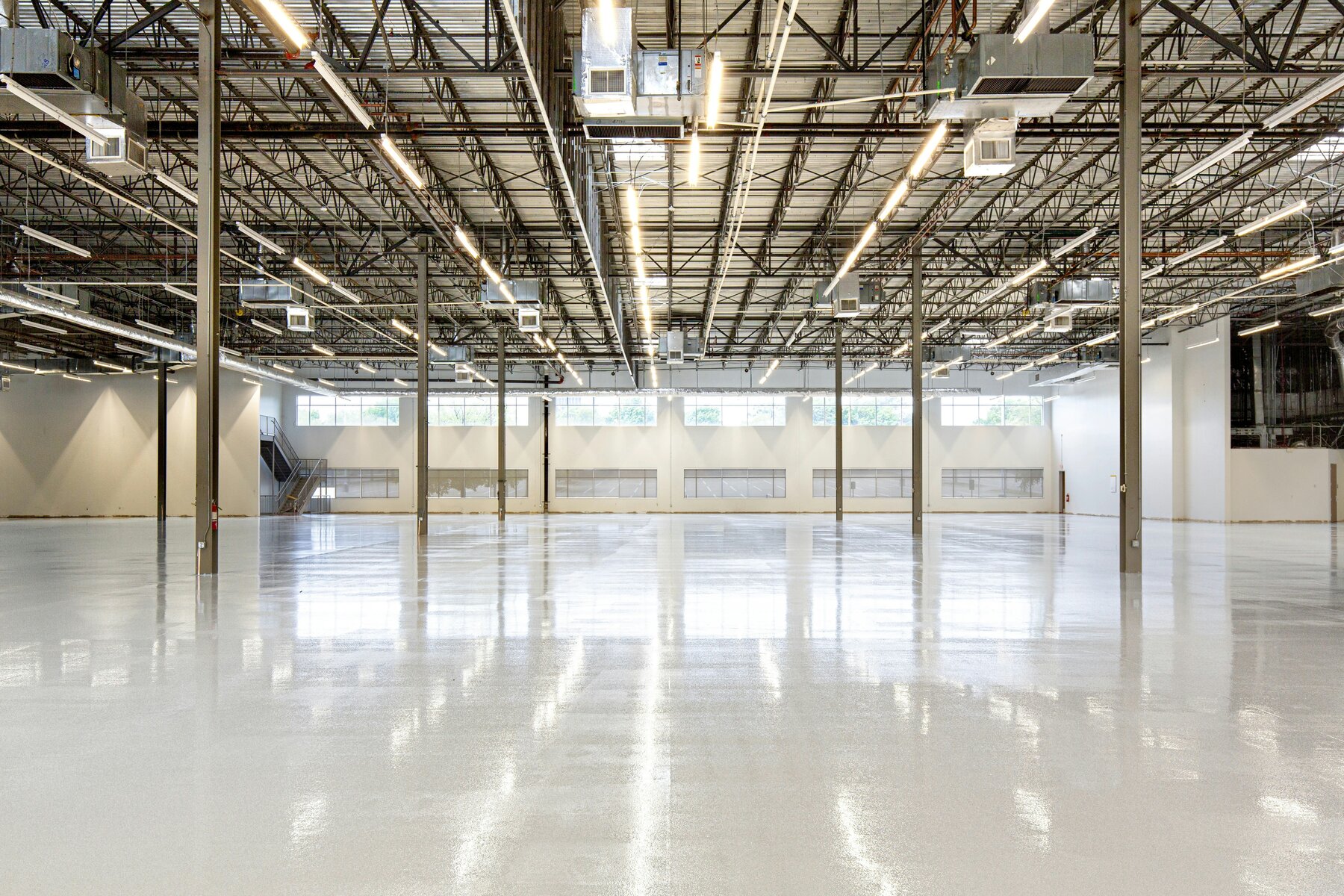 Industrial warehouse interior with LED high-bay lighting